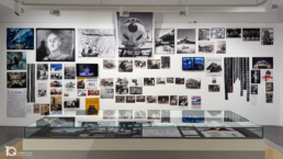 Mural de la exposici&oacute;n &iexcl;Aqu&iacute; hay petr&oacute;leo! con im&aacute;genes y textos sobre el concepto de petromasculinismo.